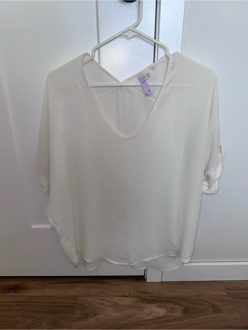 White flowy top